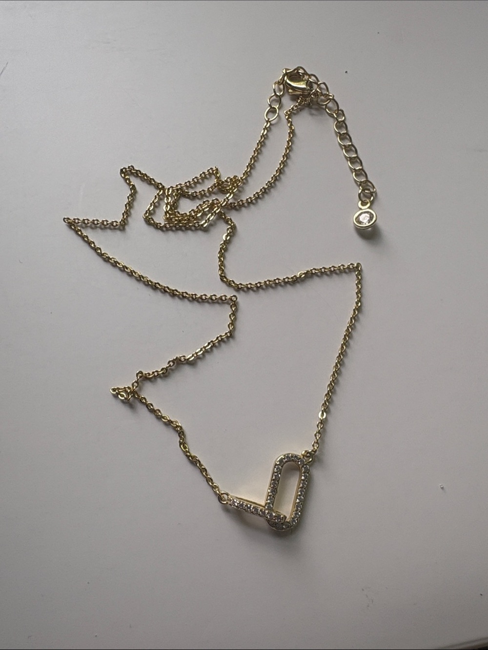 Gold-Tone Loop Pendant Necklace with Crystal Accents